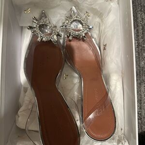 Amina Muaddi clear PVC slingbacks